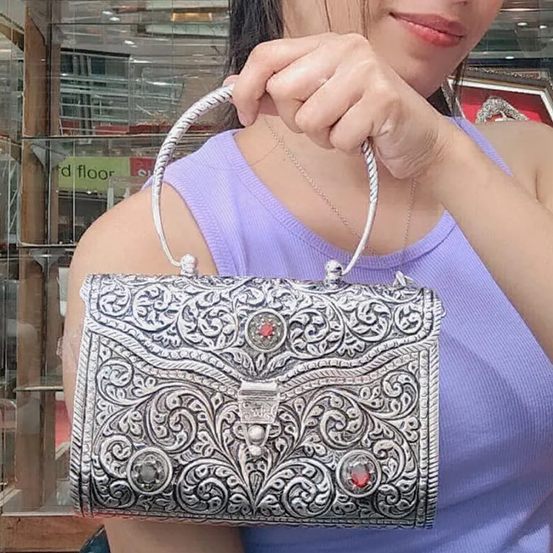 iconic silver clutch